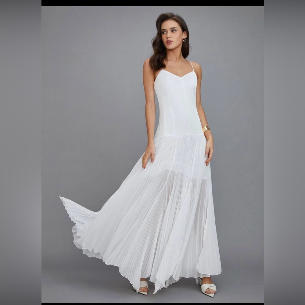 White long new  dress size Xs but fits very big like M